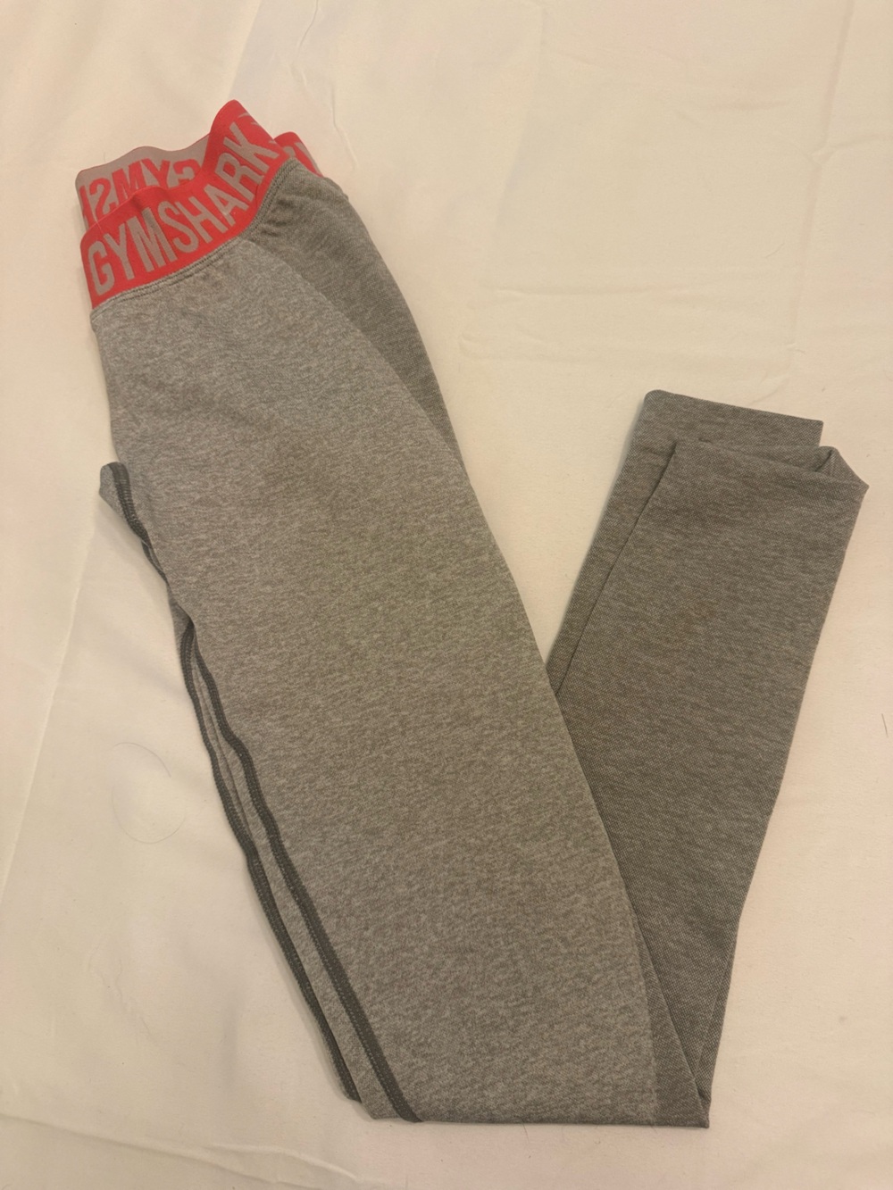 Gymshark Grey Leggings with Dark Side Stripe and Red Logo Waistband